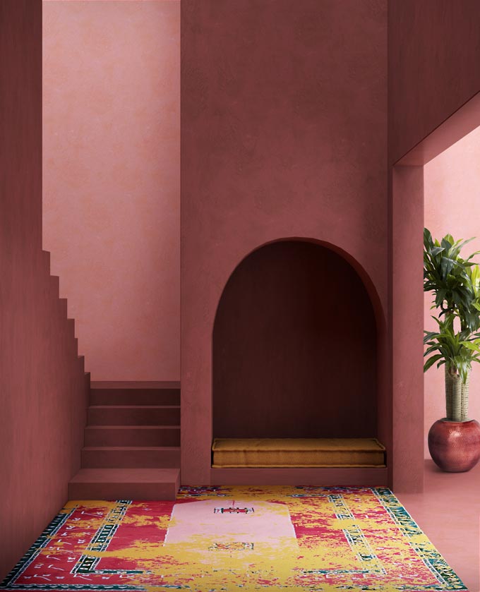 A dusky pink Moroccan inspired room with a gorgeous area rug - Medina. Image via Rug'Society.