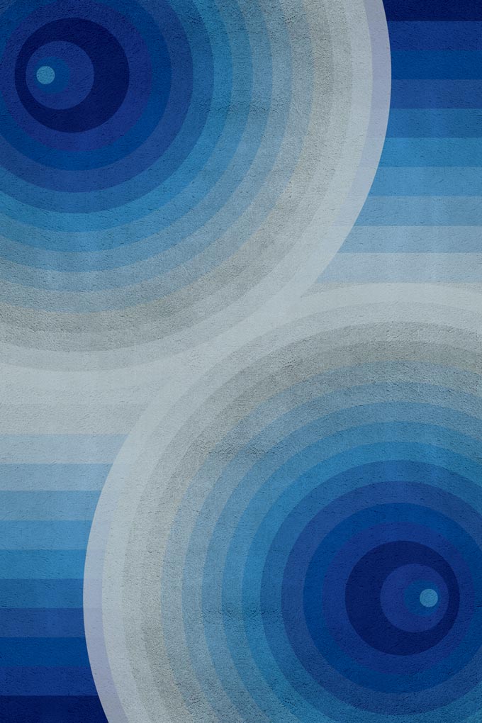 A modern rug with various blue circles forming an abstract pattern, called Puto. Image by Covet House.