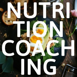 An egg sandwich in the background and the words nutrition coaching standing out on an overlay.