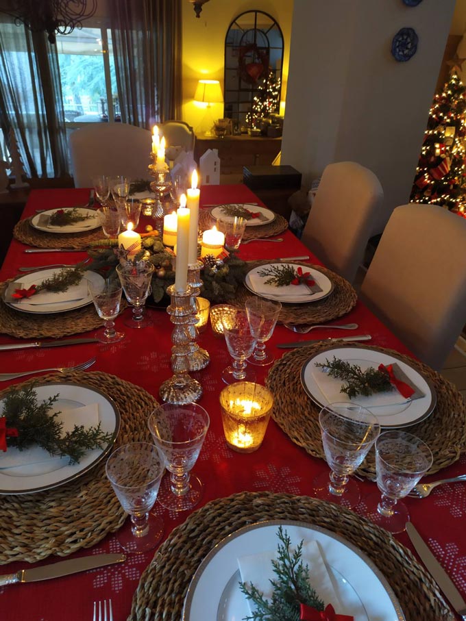 View of a beautifully styled table setting for Christmas.