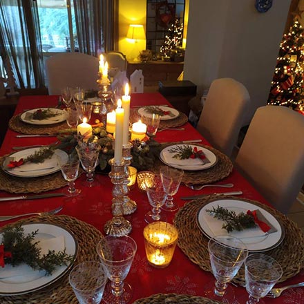 View of a beautifully styled table setting for Christmas.