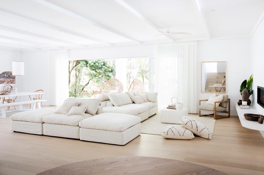 House Tour: Another view of a super-stylish all white interior. The seating area is shown here. Photo: Three Birds Renovations/Raja Homewares.