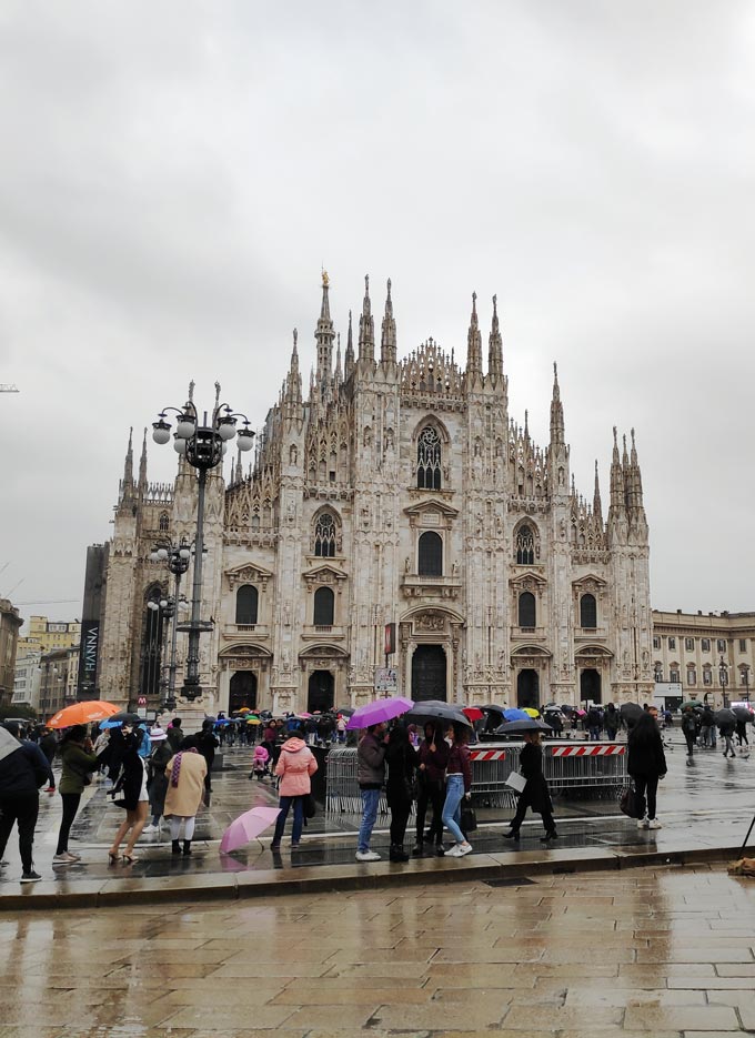 The Duomo, a gothic cathedral at Milan on a rainy day. Image by Velvet.