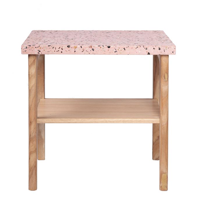 A nightstand with a pink terrazzo top and a wooden shelf - the woodrow terrazzo bedside table. Image by Fenton & Fenton.
