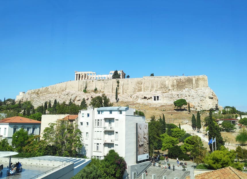 Side view of the Parthenon from the Acropolis Museum of Athens, Greece. One of the iconic buildings to see. Image by Velvet.