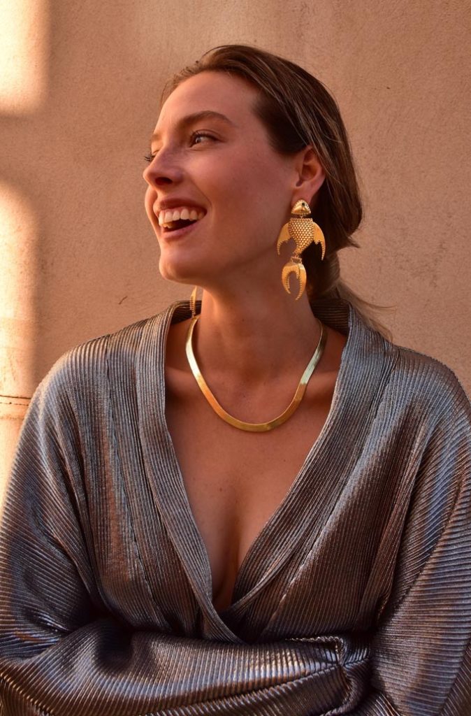 I love these statement fish like pendant earrings. Image credit: MOUNTAIN & MOON. Photographer: Ashton Cameron.