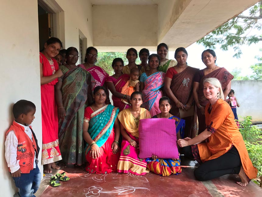 Fritha Vincent posing with other women after a Secret Pillow and Secret Scarf training.