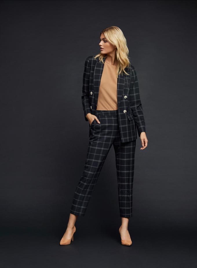 Women's power suits: A black check power suite paired with a camel top - Classy! Image: Dorothy Perkins.