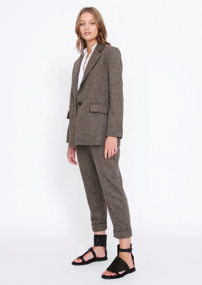A suit with a small houndstooth print pattern. Ideal for the transition from winter to spring. Image: Morrison.