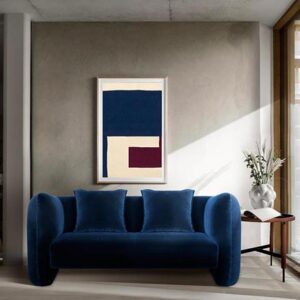 The Jacob sofa. A beautiful blue velvet sofa with some edgy cures in a minimal contemporary setting. Image: Collector.