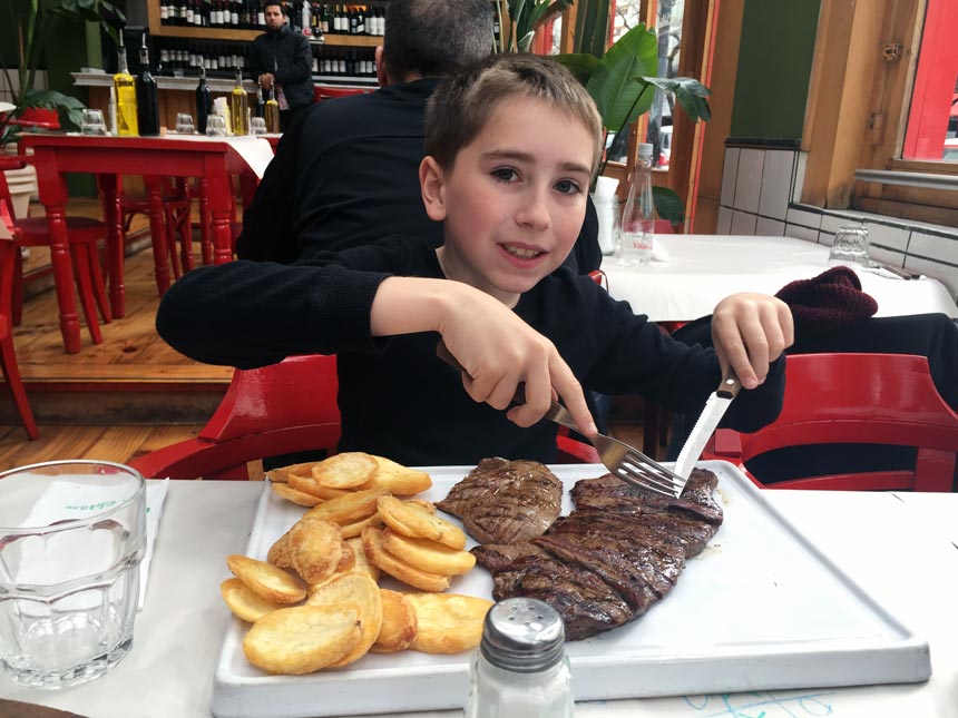 Michael about to eat a steak while in Argentina.