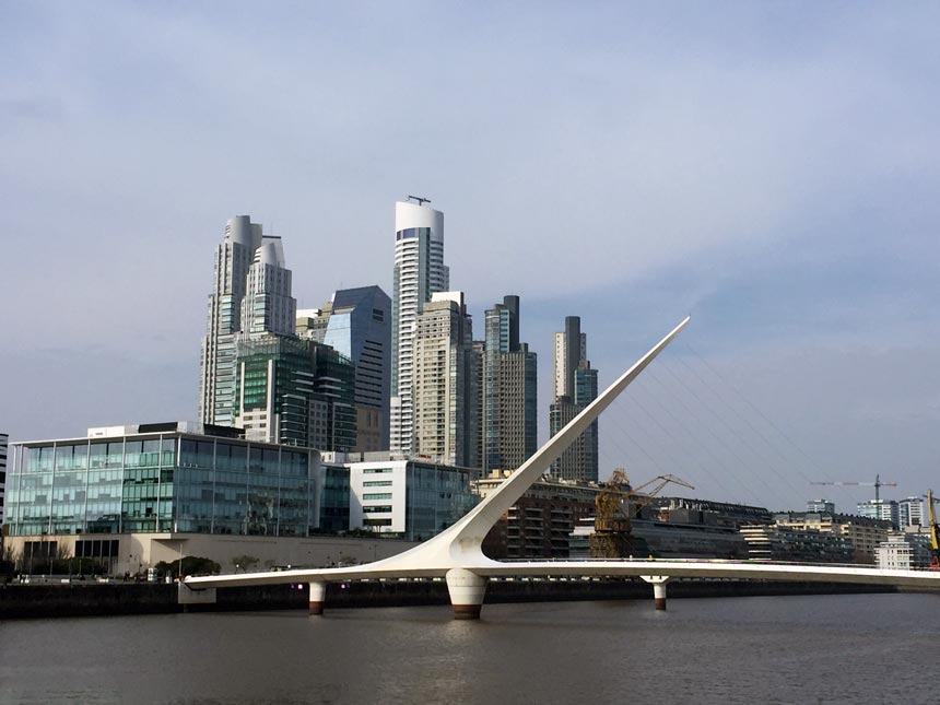 Puerto Madero in the background with Puente de la Mujer in the foreground, part of the city scape of Buenos Aires.