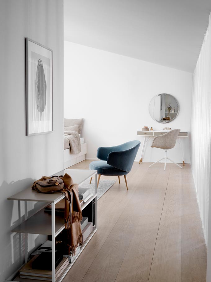 A stylish corridor to a bedroom featuring a versatile console table. Via BoConcept.