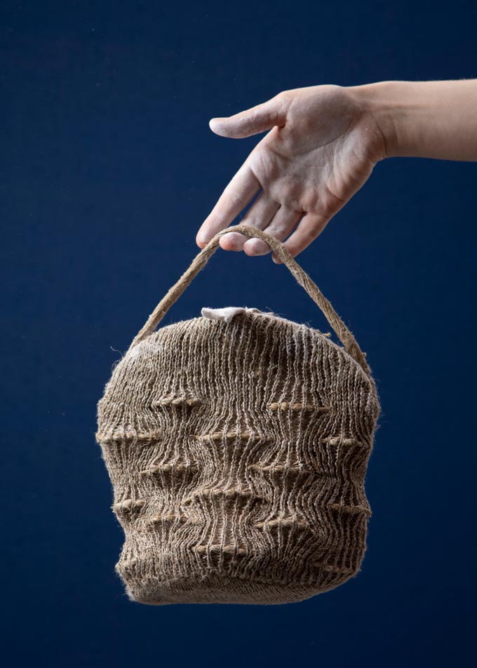 A prototype knitted accessory made from linen meant for bouldering by Anna Wetzel. The How&Wow Linen project at DDW2020.