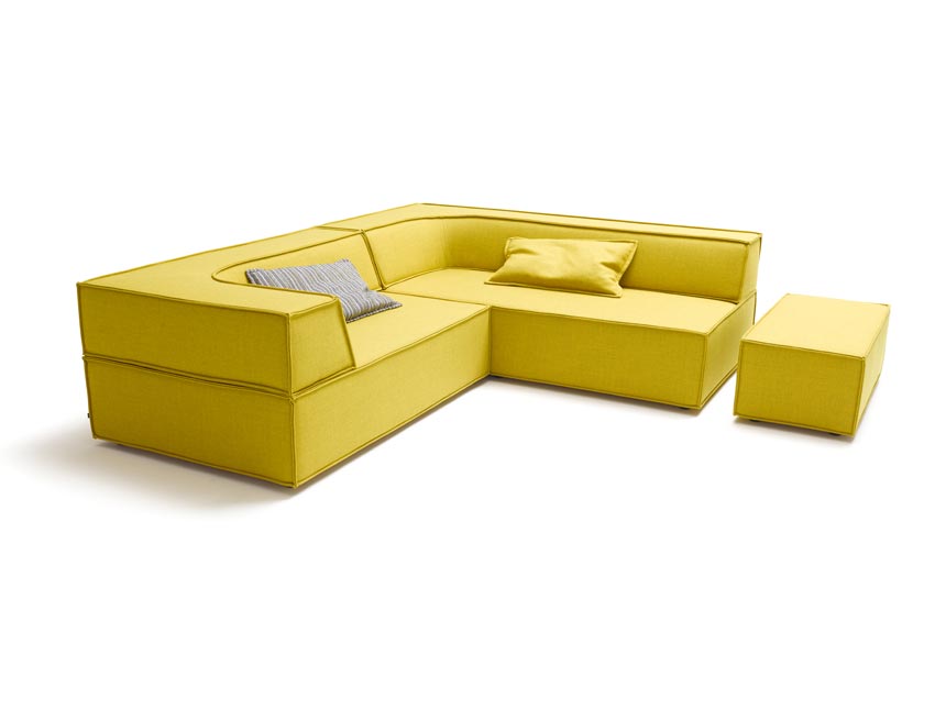 A very stylish contemporary sectional yellow sofa. Via einrichten-design.de.
