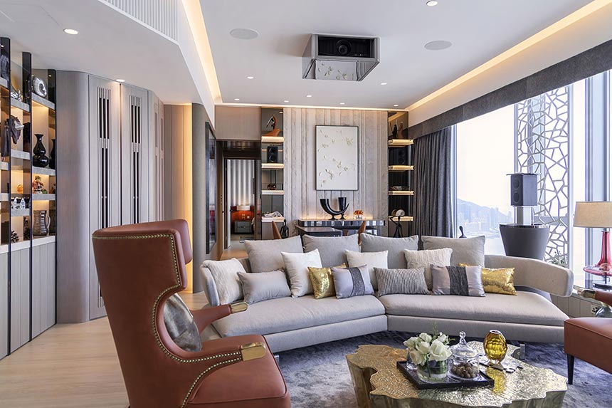 A stylish high end living room of a flat in Hong Kong with a maximalist attitude. Via Brabbu Design Forces.