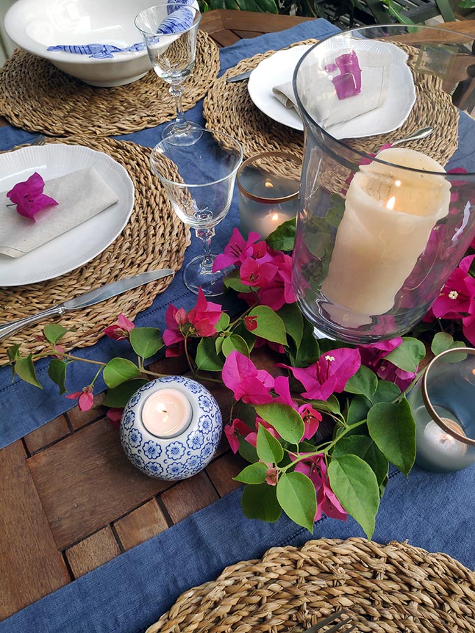 A little outdoor setup for an intimate dinner party of four I put together a while back, using a bougainvillea branch from my garden.