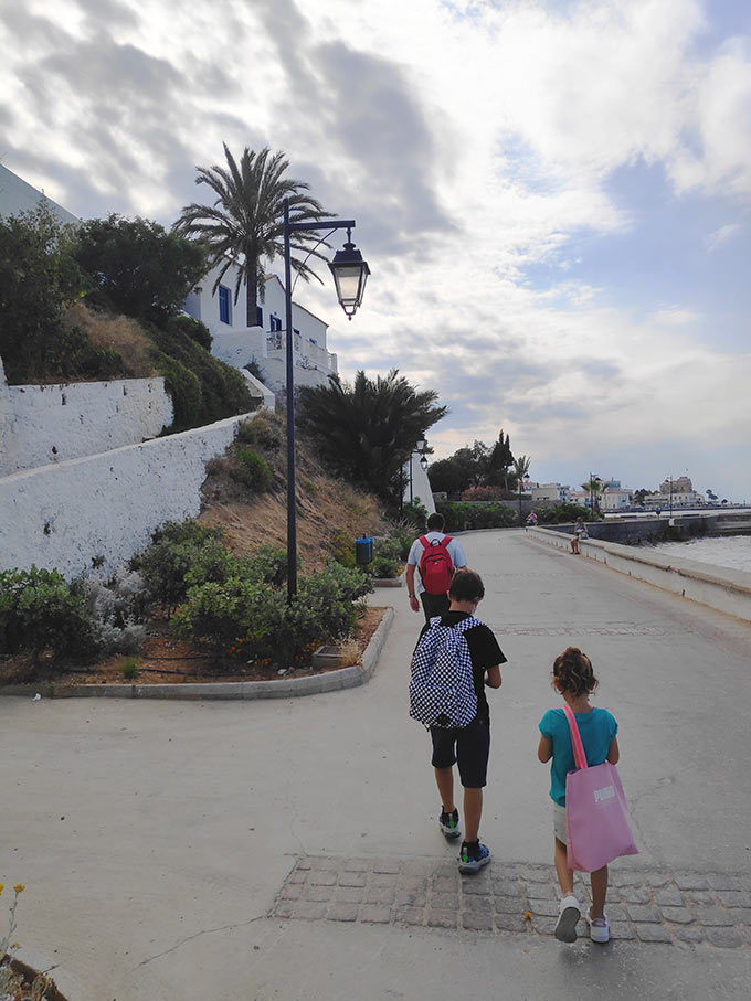 While walking along the Spetses coastline with white houses overlooking at the sea. Image: Velvet Karatzas.