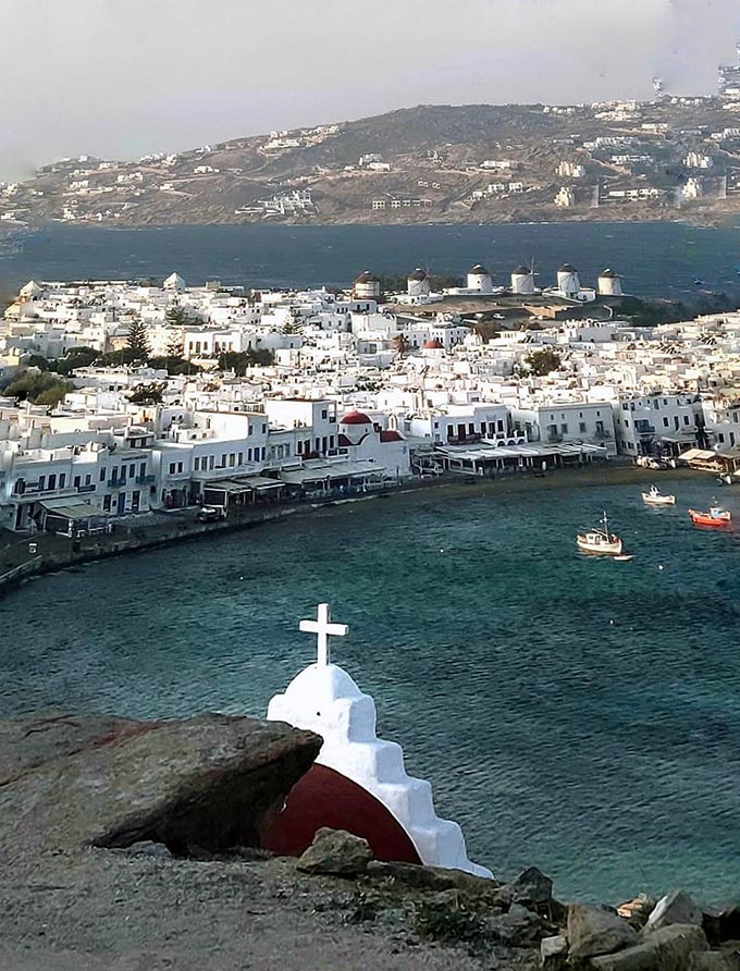 Bird's eye view of Chora, Mykons with the windmills landmark in the background.