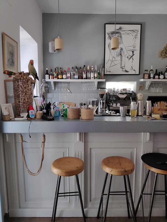 The bar inside the restaurant Perroquet Tranquille in Syros.