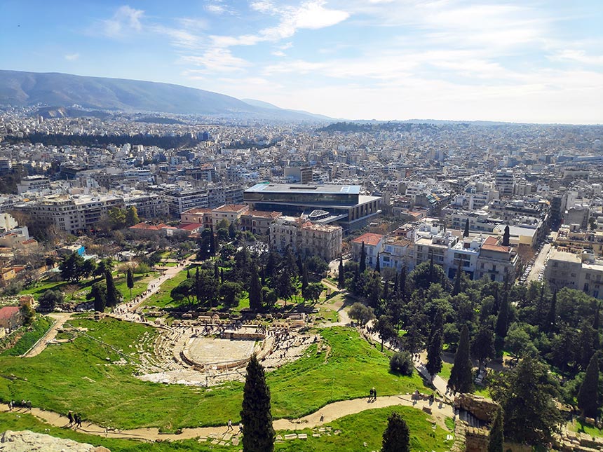 Looking at Athens from the Parthenon above with the Acropolis Museum in the center of the frame.