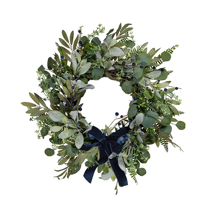 A green foliage with blue details Christmas wreath by Lights4fun.co.uk. Image shote by Simon Hylton.