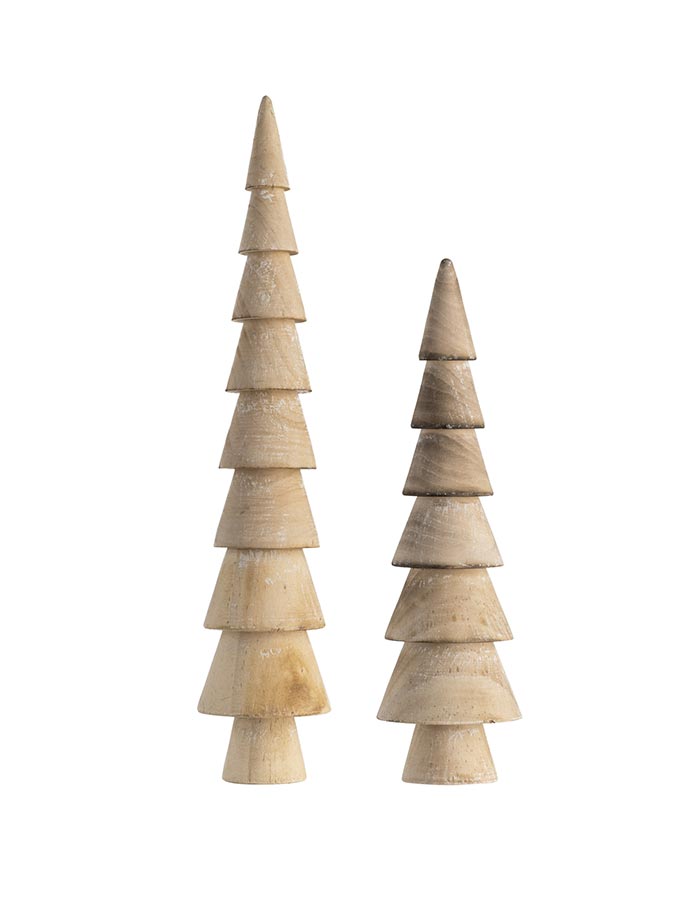 A cut-out image of a set of wooden trees - perfect for Scandi inspired Christmas decor.