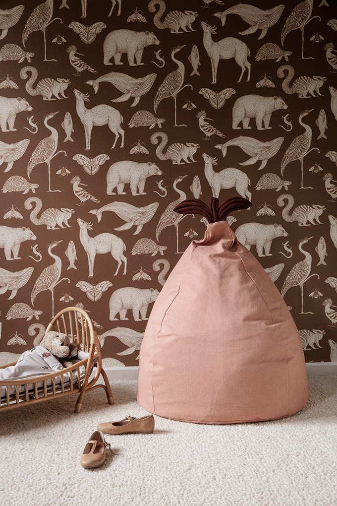 A lifestyle image featuring the Ferm Living pear shape bean bag, perfect for a kid's room. Via Nest.co.uk.