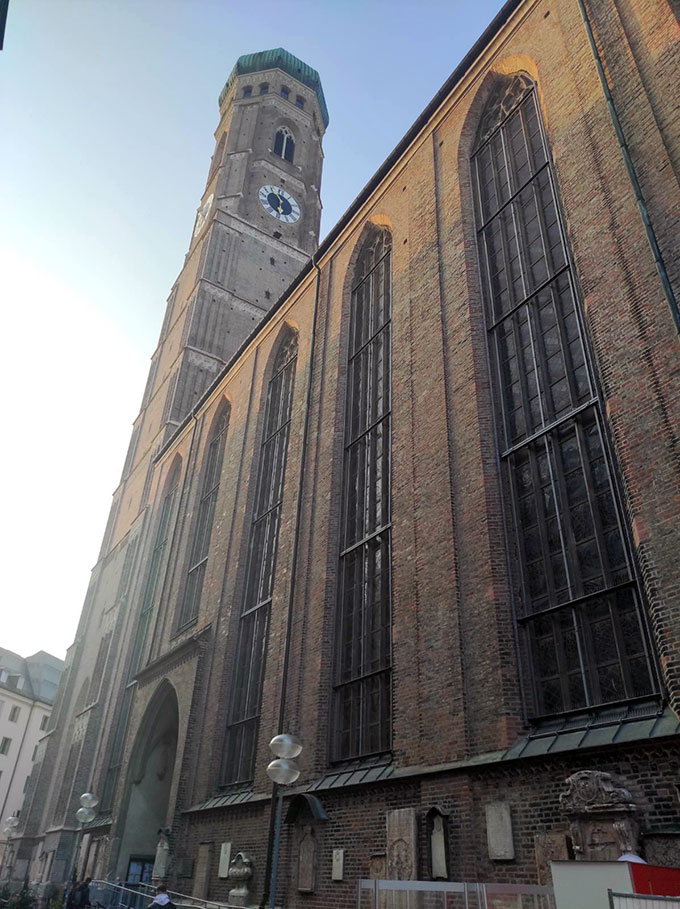 The red brick side facade of the Frauenkirche in Munich.