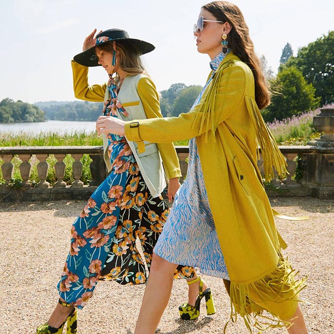 Two women wearing dresses for that dopamine dressing effect. Image: Top Drawer.