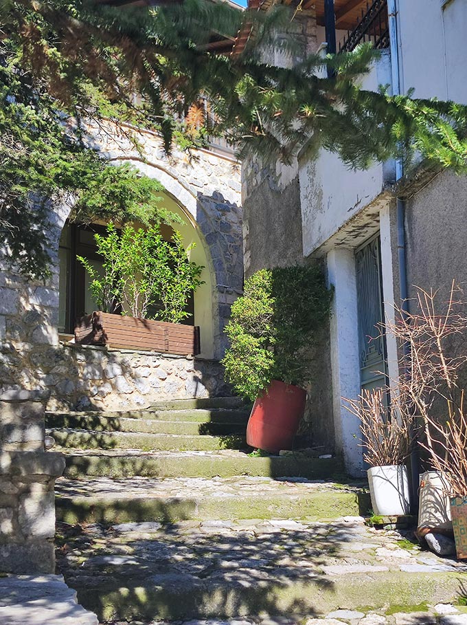 Stone paved step alley through the village of Stemnitsa.