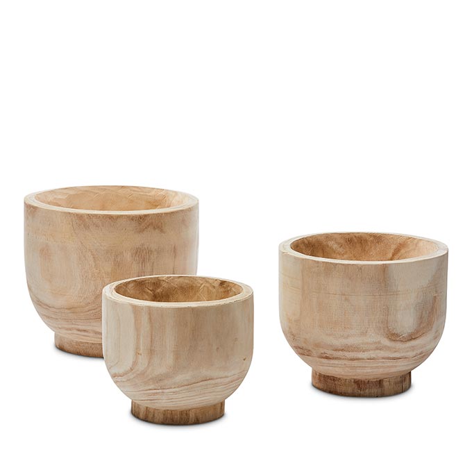 Packshot of three timber footed pots in different sizes. Image: Adairs.