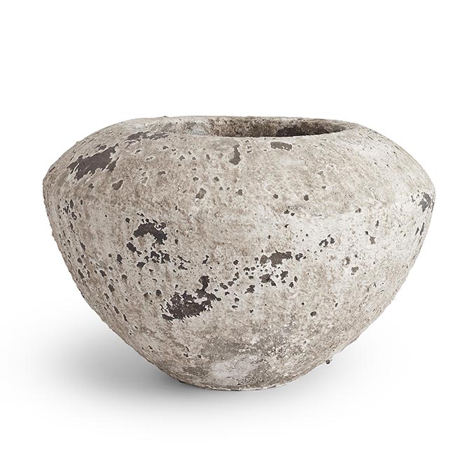 A packshot of a stone planter that looks vintage. Image: Soho House.