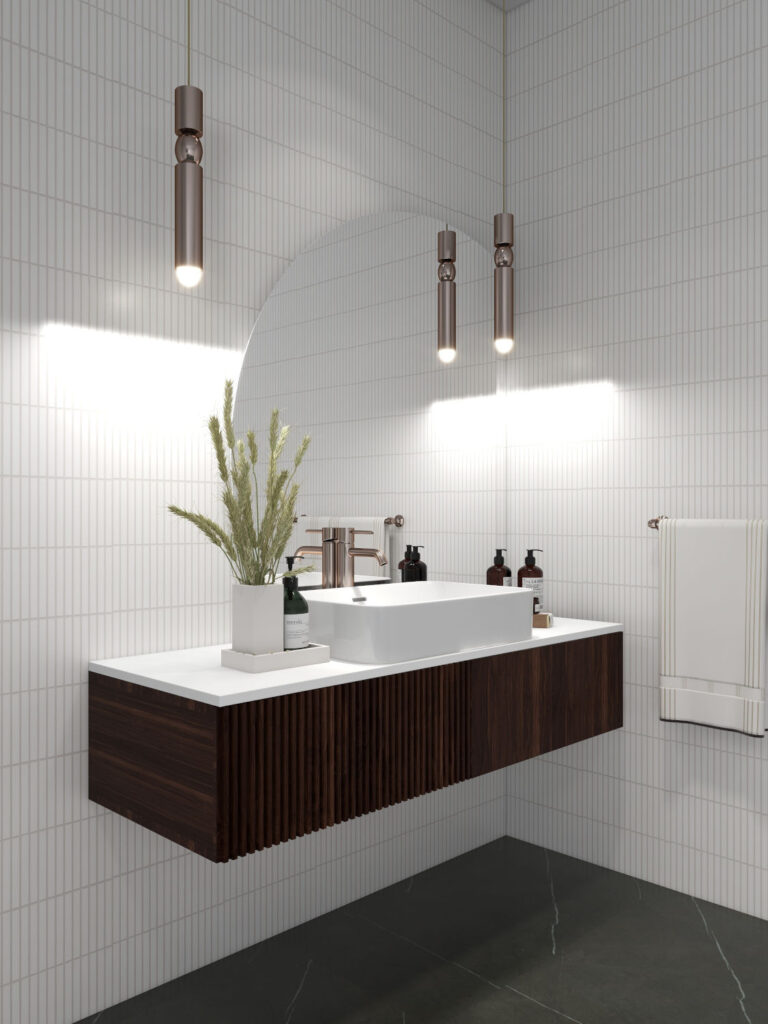 A contemporary white bathroom with Kit Kat tiles, a floating dark wood vanity with a white over the counter wash basin and muted dark green marble flooring. Image copyright via Velvet Karatzas Interiors Atelier.